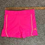 Head  hot pink athletic shorts Photo 0