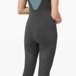 Lululemon black bodysuit with laser cut outs, rare size 6 yoga Size M Photo 0
