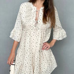 Storia  mini dress tie front bows beige airy flax ditsy floral block print tiered Photo 0