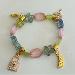Colorful Charm Bracelet with Gold Accents Photo 1