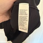 Free People NWOT  Xena Tank in Black High Neck Loose Arms Size Medium Photo 7