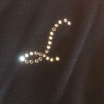 Carolyn Taylor Black top with M rhinestones sz small Photo 1