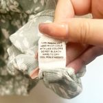 E & M  Juniors Green Floral Babydoll Smocked Back Adjustable Strap Tank Top Photo 8