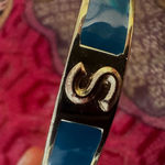 Blue and gold tone S monogram bracelet Photo 1