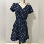 Loft Navy Blue V-neck fit to flare zip back dress w/ pockets. Size 2 never worn Photo 3