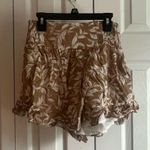 Boutique Cute yellow shorts with bow on the back. Photo 0