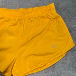 Nike  Women's Vibrant Yellow Athletic Shorts Photo 1