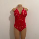 Ellison Stand out in this vibrant red maxi dress. Features stylish cutout patterns. Perfect for beach outings or summer events. Photo 10