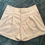 Urban Outfitters  Tan pleated trouser shorts Photo 0
