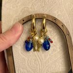 Handcrafted fish dangle earrings Gold Photo 0