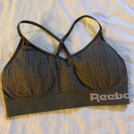Reebok padded sports bra with cross back adjustable straps Size Medium Photo 0