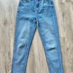 American Eagle  Medium Wash Mom Jeans Raw Hem Size 0 Photo 2