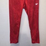 Nike Dri Fit red patterned cropped athletic leggings Photo 2