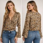 NWT Sadie and Sage long flare sleeve v Photo 1