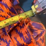 Boutique Vibrant Orange and Purple Aztec Patterned Long Sleeve Romper, Sz S Photo 11