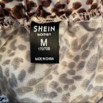 SheIn || Animal print ruffled short skirt with elastic waist Photo 4