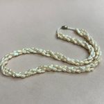 Three Strand Freshwater Pearl Necklace Hand Photo 7