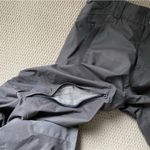 Helly Hansen  medium insulated dark grey snow pants. Adjustable waist and pockets Photo 8
