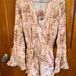 Agua Bendita  Pink and Brown Floral Wrap Romper Photo 0