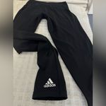 Adidas  Women’s Athletic Sports leggings in black. EUC. Size Medium. Photo 1