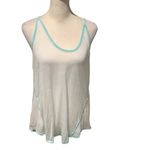 Elegant White Tank Top with Aqua Accents Photo 3