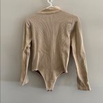 Pretty Little Thing Long Sleeve Tan Ribbed Bodysuit Photo 3