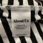 About Us  Black and White short sleeve open back fitted mini dress Photo 3