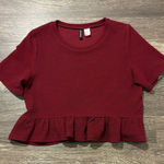 Divided Maroon peplum top Photo 0