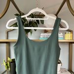 EXPRESS Scoop Neck Thong Bodysuit in Basil Photo 3