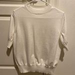 White size small short sleeved sweater Photo 0