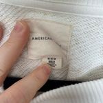 American Eagle  Women’s Medium Yellow White Paisley Patterned Sweatshirt Photo 1