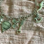 Silver Charm Bracelet with Unique Pendants Photo 3