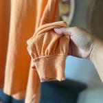 Free People NWOT We The Free Chill Out Cold Shoulder Pullover Top orange xs Photo 5