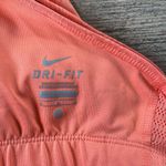 Nike Women’s Classic Racerback Dri Fit Athletic Tank in Orange Size Medium Photo 6