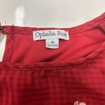 Ophelia Roe  beautiful  top. medium. The sleeves are awesome. Flowers are unique Photo 3