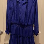 Apricot Lane  Royal blue long sleeve silky mini dress with ruffle hem Photo 0