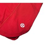 Lululemon Speed Up Short with a 4" inseam in Flamenco Red Swift Photo 7