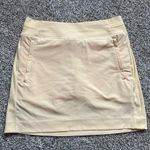 Athleta light yellow mini tennis skirt size 4 Photo 1