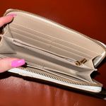 Badgley Mischka  Cream and White Wallet with Gold Logo. Brand new Photo 1