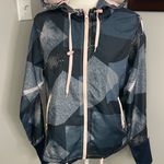 Zyia  Blue Pink Geometric Windbreaker Jacket Medium Workout Gym Colorful Photo 1