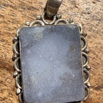 sterling silver pendant with a rectangular moonstone ornate bezel setting. Photo 0