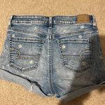 Daisy Embroidered Light Wash Jean Shorts Photo 1