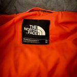 The North Face grey puffer Photo 1
