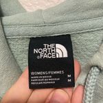 The North Face Women’s Mint Green Graphic Hoodie Size Medium Photo 7