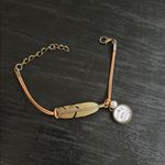 Gold Feather Charm Bracelet Photo 0