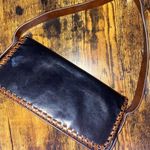 Black mini shoulder bag with brown accents Photo 0