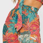 Pretty Little Thing Sheer Orange Big Leaf Print Wide Leg Beach Pants Size 8. Photo 1