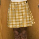 Jolt Yellow, Black, and White Checkered  Pleated Skirt Photo 1