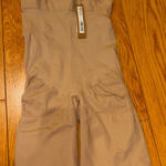 SKIMS Sheer Seamless Mid Thigh Shapewear Shorts Photo 0