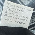 Brandy Melville black and grey striped pants. They would probably fit a size 0. Photo 5